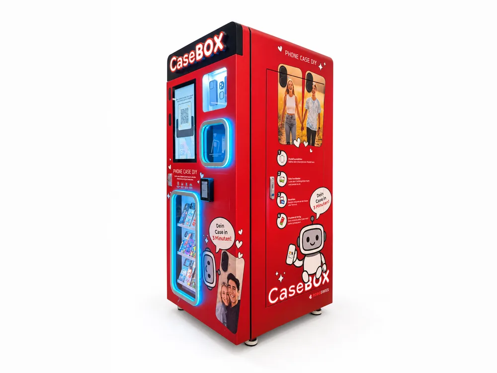 The CaseBOX machine: touchscreen, payment terminal and a display of cases.
